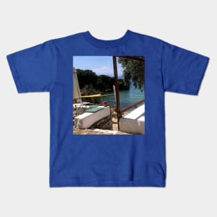 Paradise view on blue sea and beach from Mediterranean balcony in Greece Kids T-Shirt